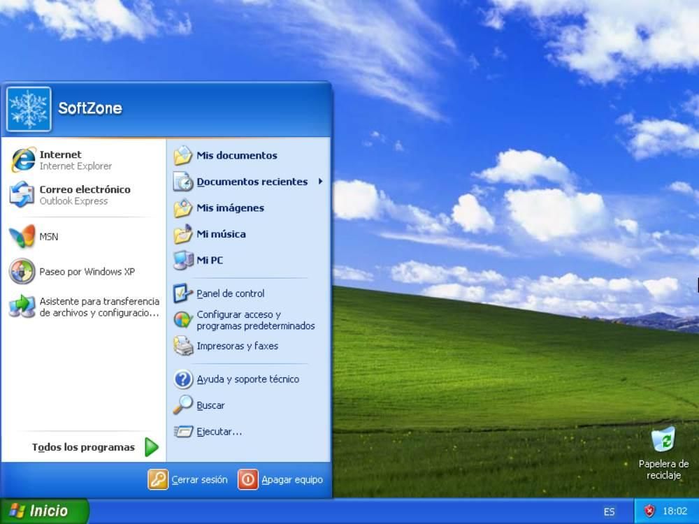 Escritorio de Windows XP con el menú inicio abierto, fondo Bliss de pradera y el tema de colores original.