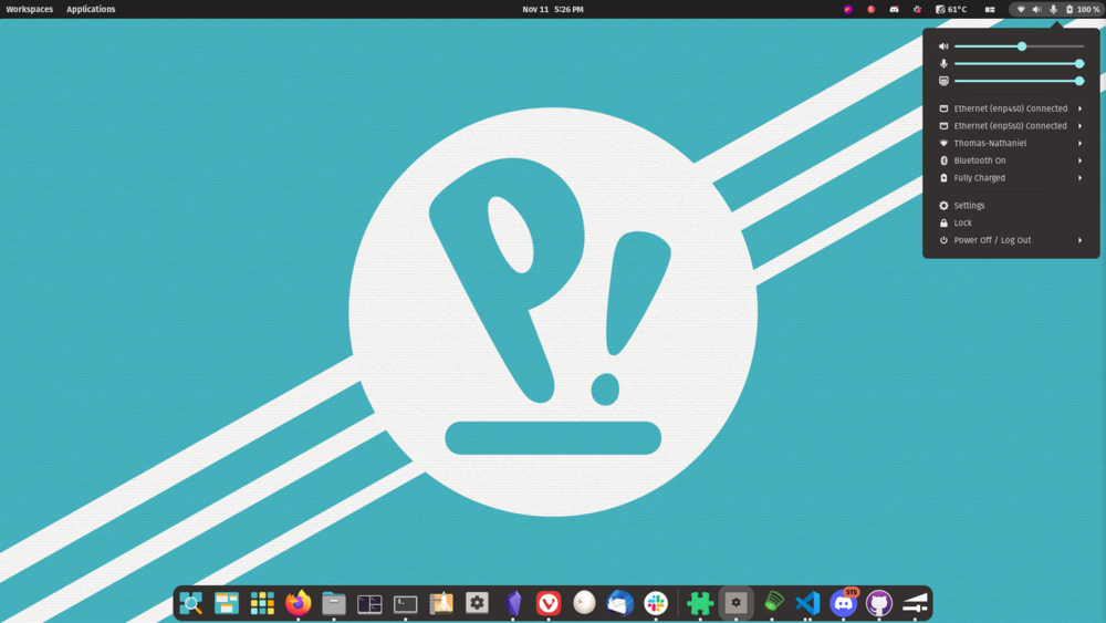 Interfaz del escritorio de la distro de Linux Pop!_OS, donde encontramos armonía y organización con fondo celeste.