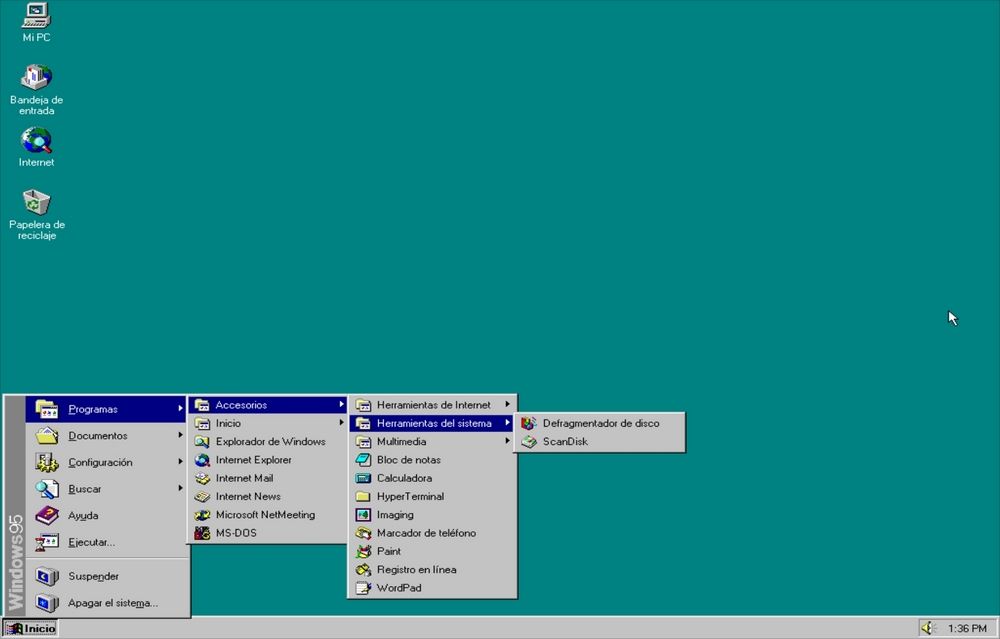 Interfaz clásica de Windows 95 en español con el menú de inicio abierto mostrando herramientas del sistema.